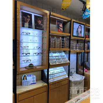 【定制暴龙烤漆眼镜展示柜自选店双面中岛柜台精品高柜款式大全】-